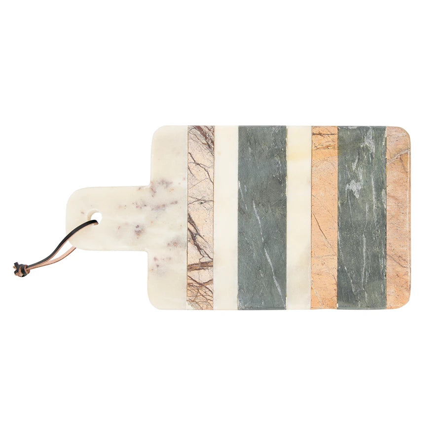 marble board made from assorted marbles in stripes with a handle on one end.