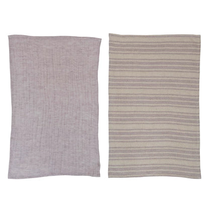 both solid gray and striped gray woven cotton tea towel displayed against a white background