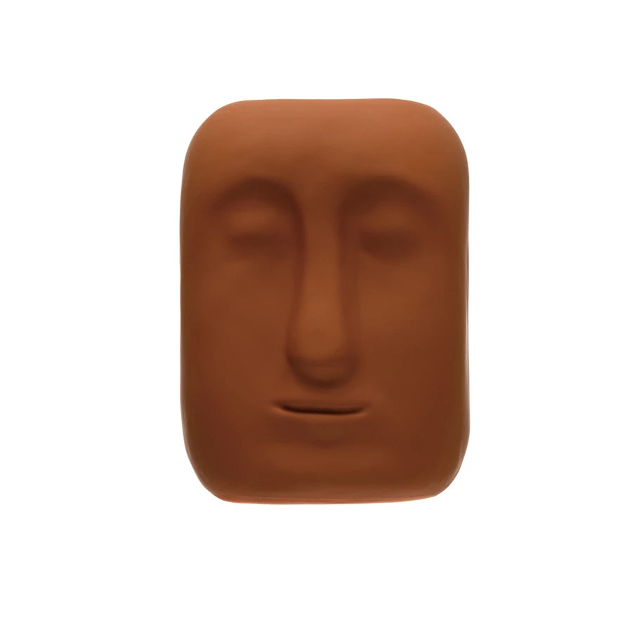 terracotta face planter on a white background.