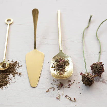 Gold Electroplated Cake Server arranged with other serving utensils