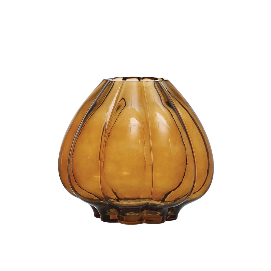 amber color glass vase on a white background.