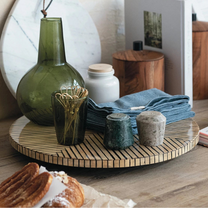 Lazy Susan with Geometric Stripes with napkins, shakers and vases arranged on it