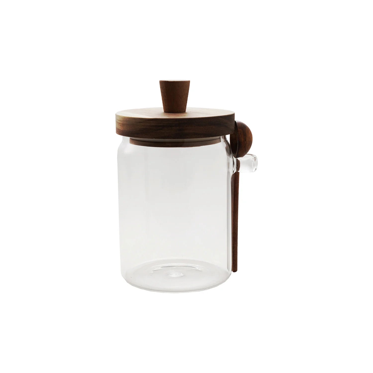 Clear glass jar with wooden lid and spoon hangs on the side of it
