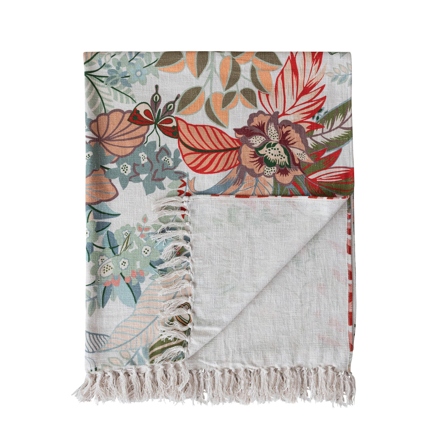 folded Floral patterned throw blanket with fringed edge on a white background