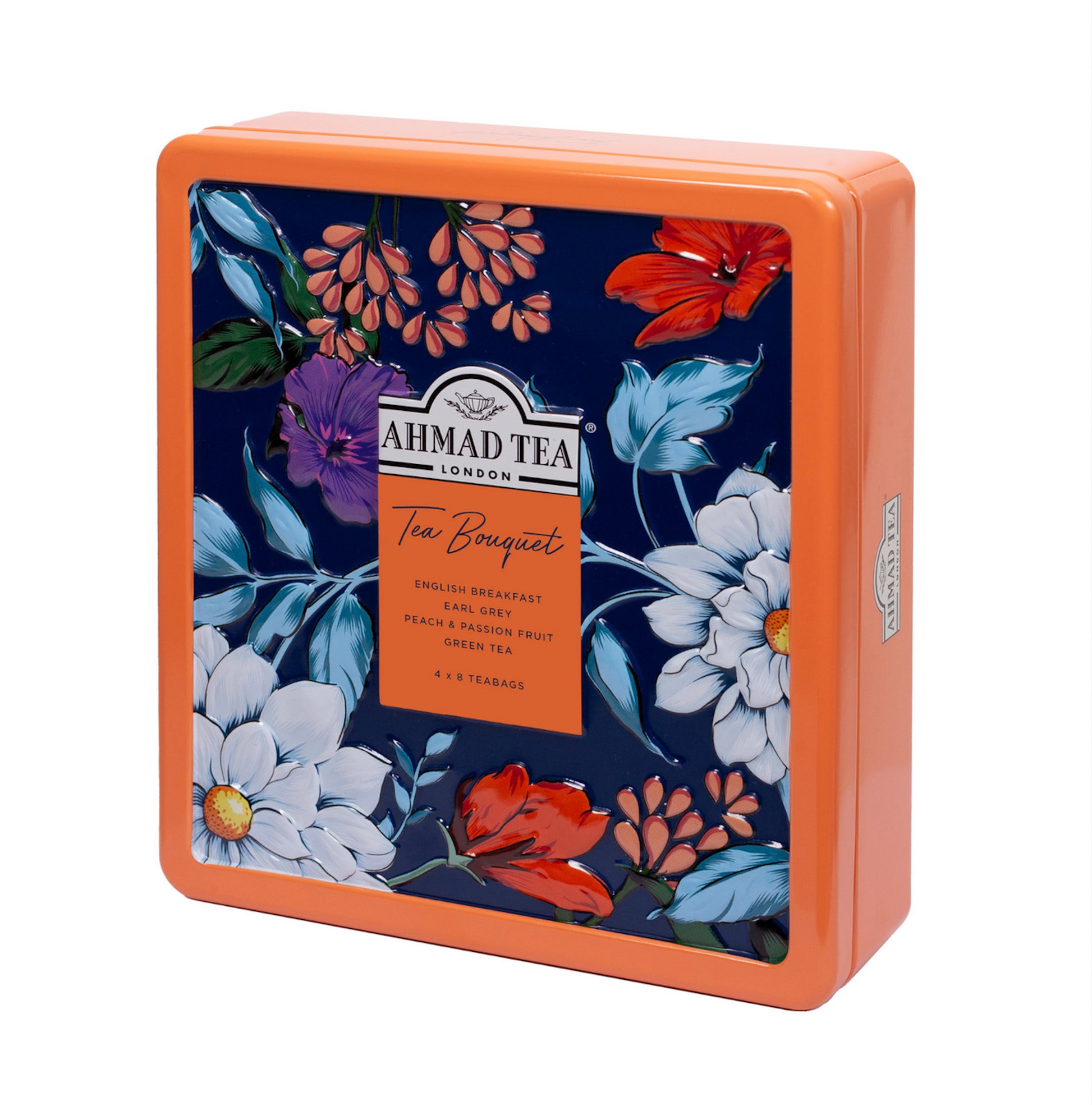 orange Ahmad Tea tin with floral design on a white background