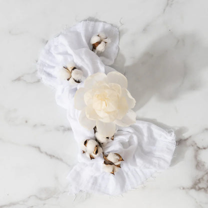 Classic Linen Flower Diffuser arranged with white linen cloth and cotton stems