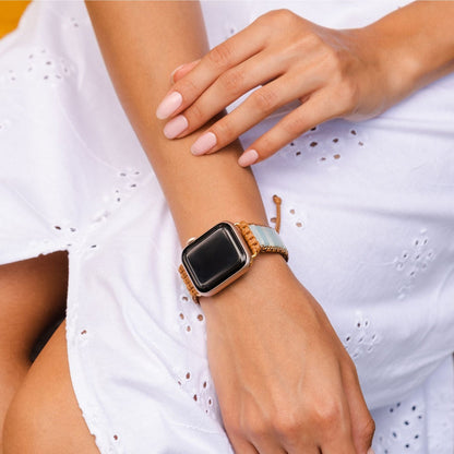 close-up of person's arm with Amazonite strap on an apple watch.