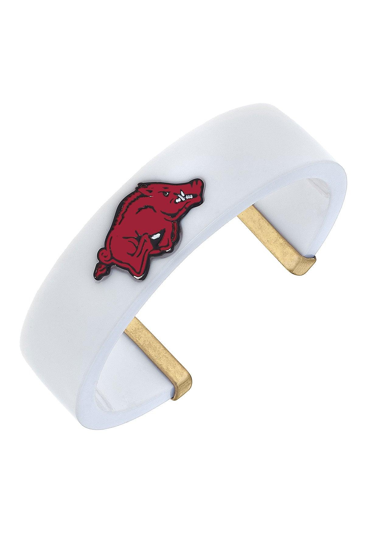 white resin cuff bracelet with red razorback logo on it.