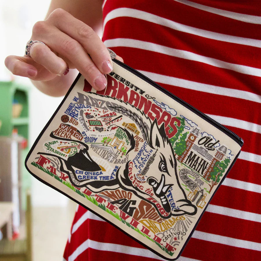 hand holding University of Arkansas zipper Pouch