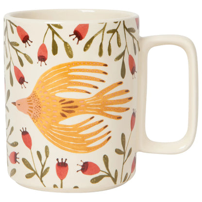 off-white mug with yellow bird and foliage printed on it.