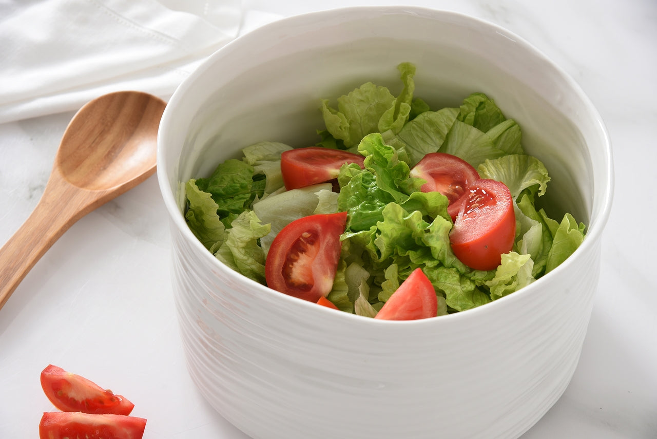 le blank large bowl with salad in it