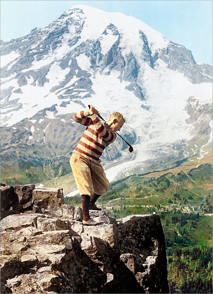 front of card is a golfer standing on a ledge with a snowy mountain in the background