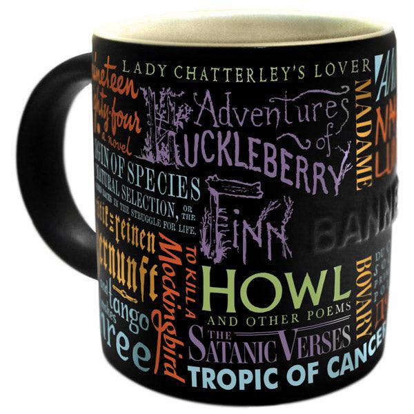 black mug with book titles in different colors