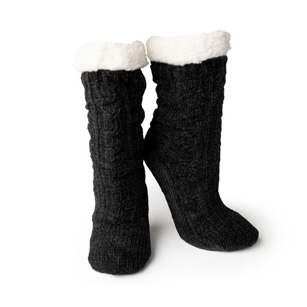 black Beyond Soft Slipper Socks displayed on a white background