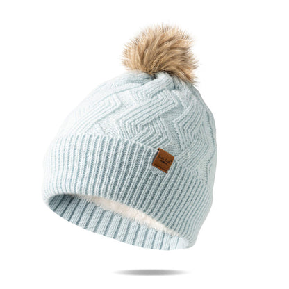 sky blue  Mainstay Pom Hat with faux fur pom displayed against a white background