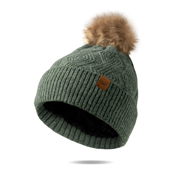 green Mainstay Pom Hat with faux fur pom displayed against a white background