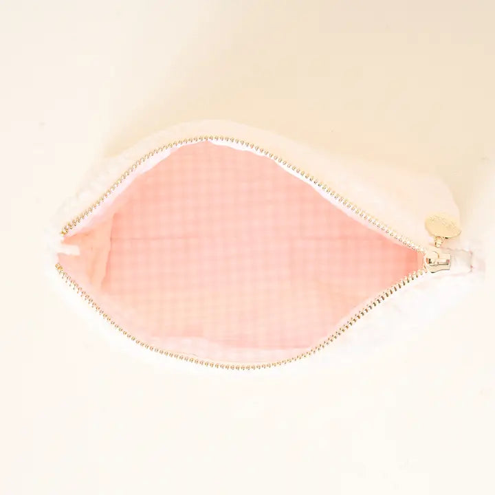 interior view of bows zipper pouch.