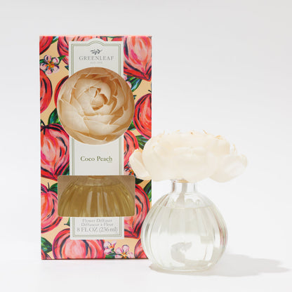 greenleaf coco peach flower diffuser and a diffuser in its box on a white background