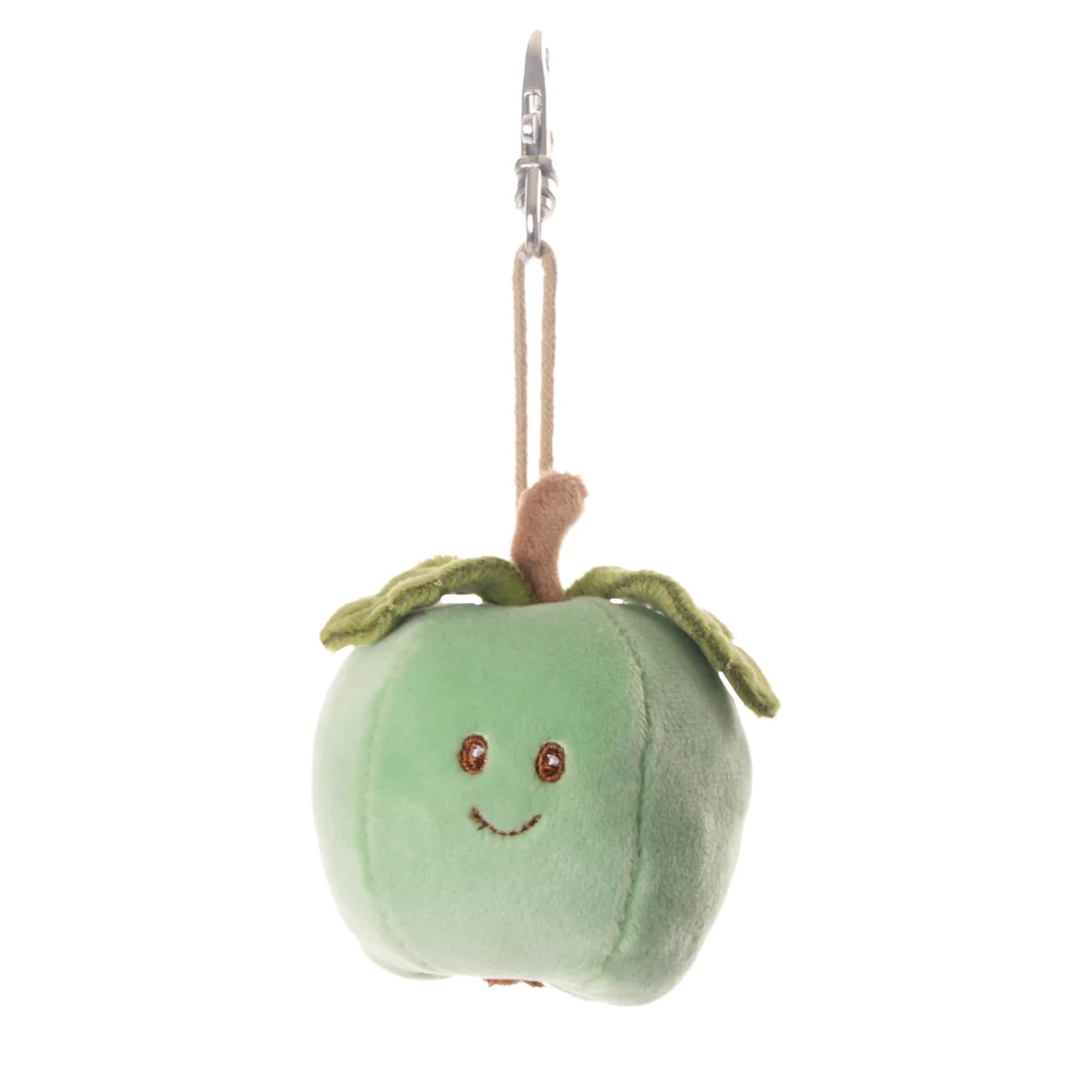 smiling green apple bag charm shown on a white background