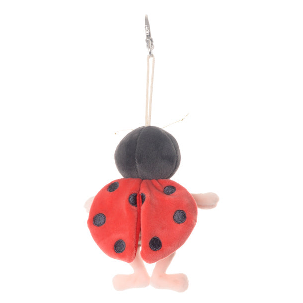 back view  of ladybug plush bag charm showing red wings with black dots on them