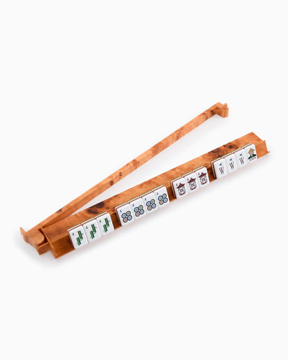 one rack pusher set with mahjong tiles on it