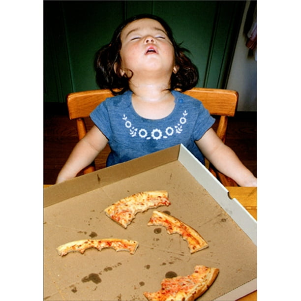 front of card is a little girl fallen asleep in her chair at the table in front of an empty pizza box