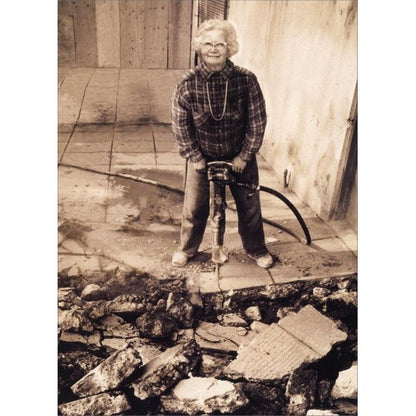 front of card has a black and white picture of an older lady with a jackhammer 