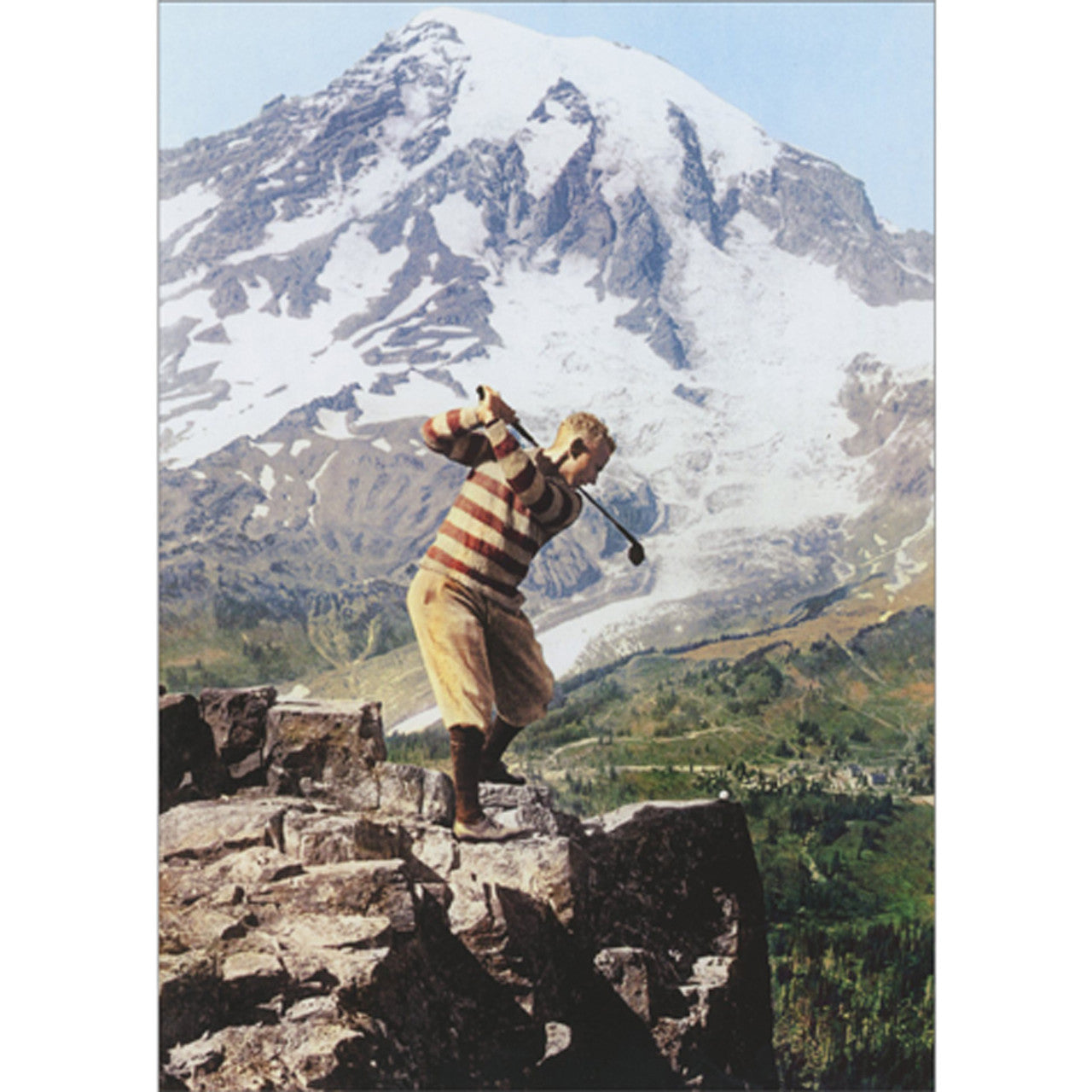 front of card is a golfer standing on the edge of a cliff with a snowy mountain in the background