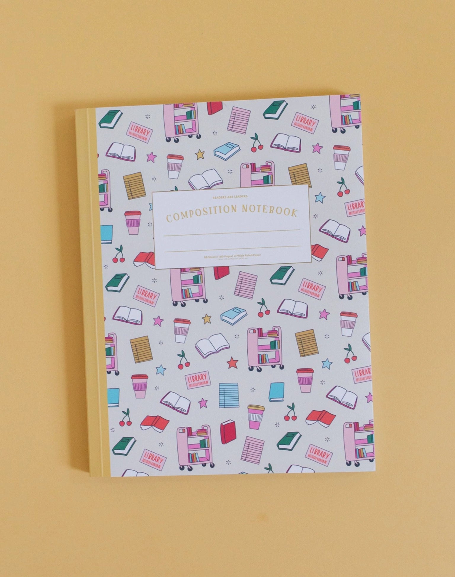 library themed composition notebook shown on a beige background