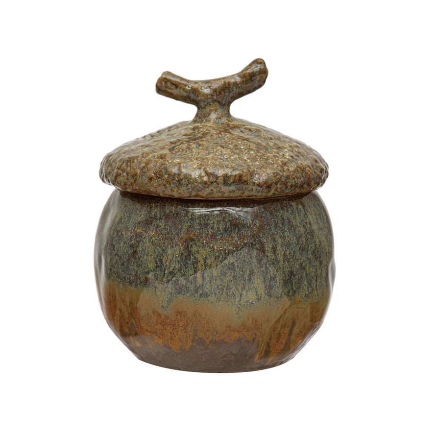 stoneware acorn canister displayed against a white background