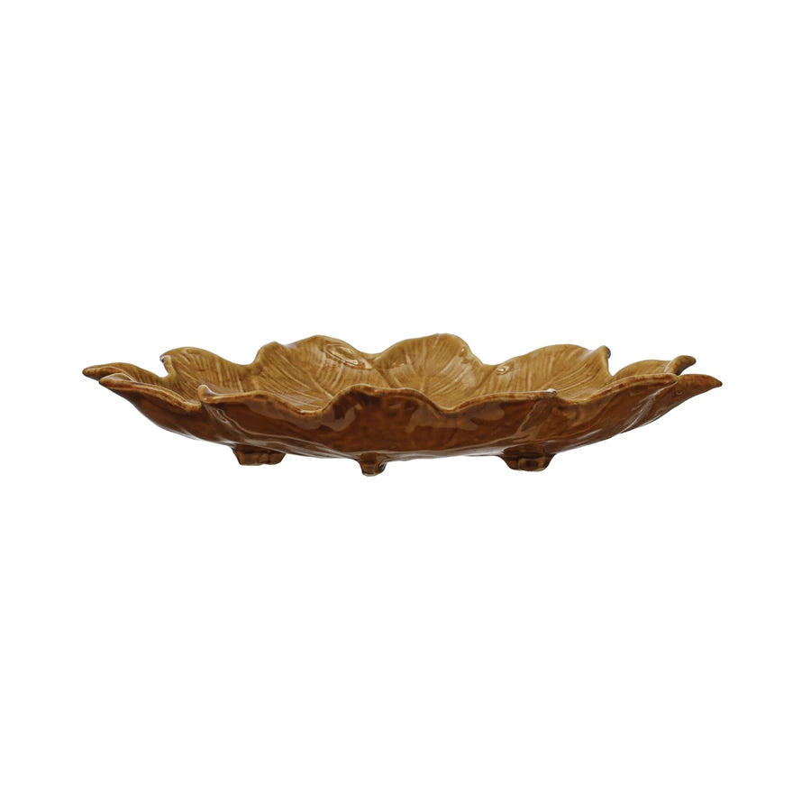 side view of the large stoneware flower plate displayed on a white background