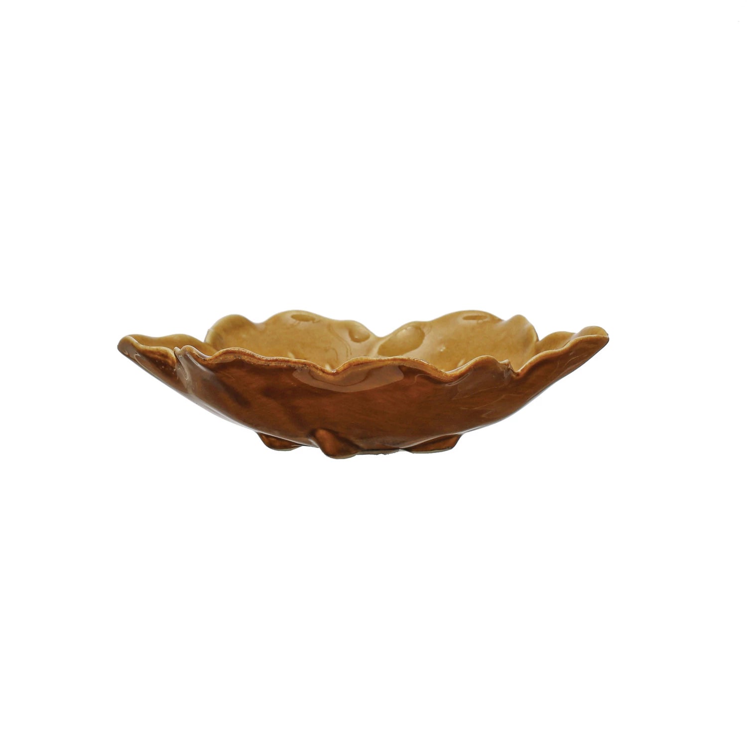 side view of the stoneware flower plate displayed on a white background