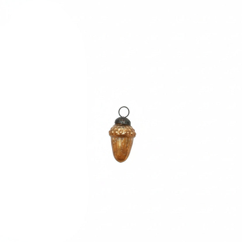 single glass acorn shown on a white background