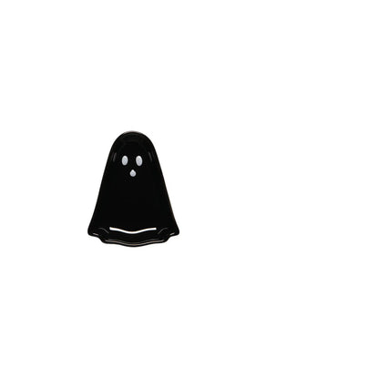 black ghost shaped small dish with white dot eyes and mouth shown on a white background