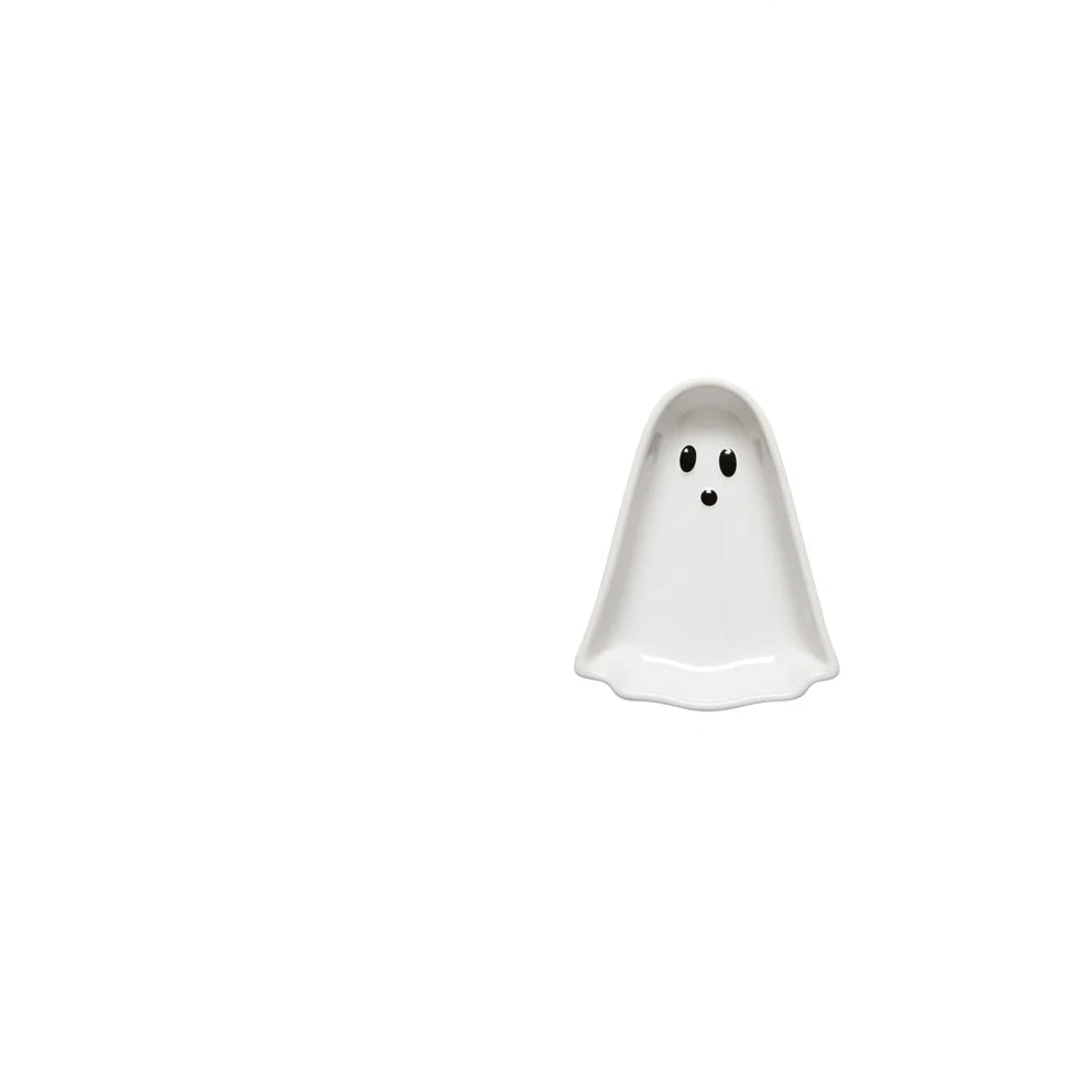white ghost shaped small dish with black dot eyes and mouth shown on a white background