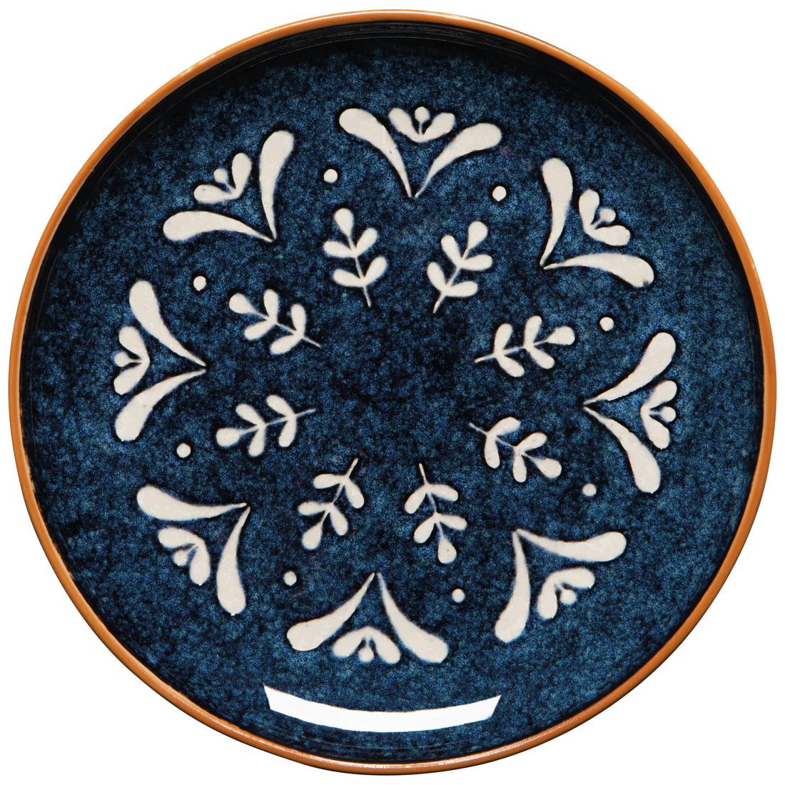 A round stoneware appetizer plate with a night-sky blue color and a mosaic of radial floral patterns.