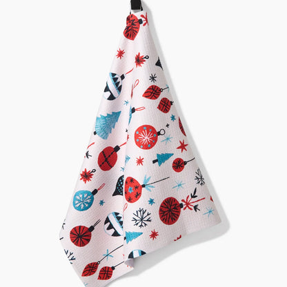 Ornaments Tea Towel draped on a hook