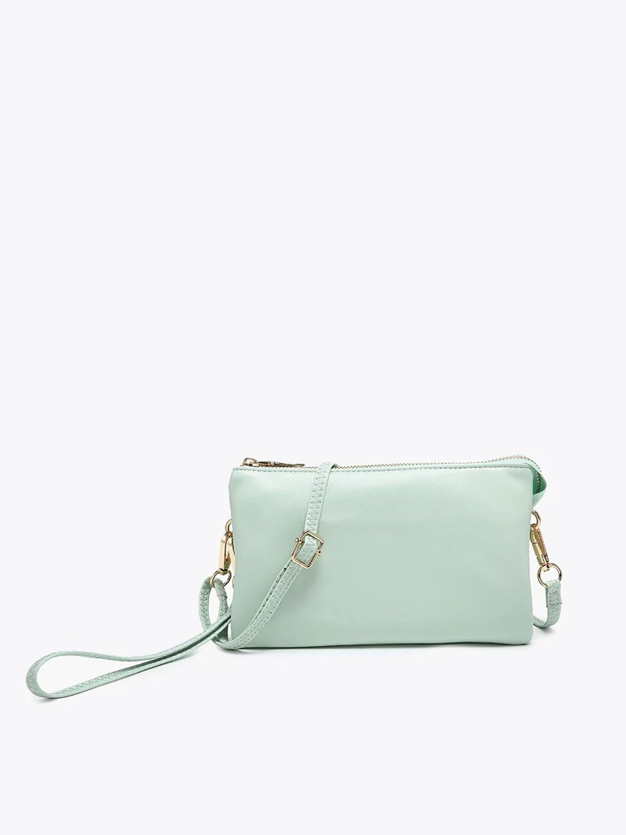 light mint christine wristlet crossbody on a white background