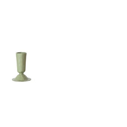 small Green taper candle holder on a white background