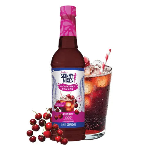 bottle of Cherry Cola Sugar Free Syrup arranged with cherries and beverage