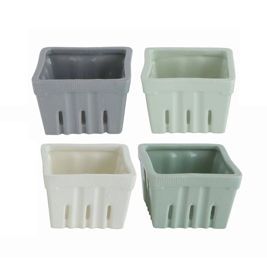 Four colors of stoneware Berry baskets.