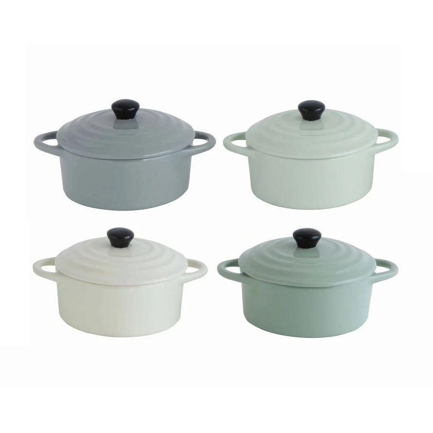 blue, white, light green, and green mini stoneware bakers with lids displayed against a white background