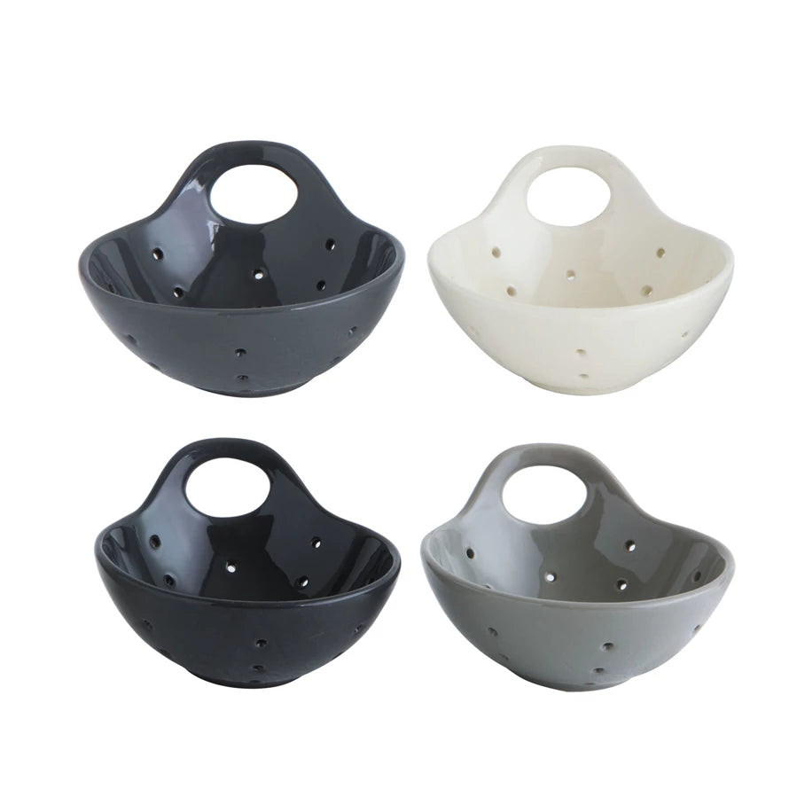 all four colors of stoneware berry bowls displayed against a white background