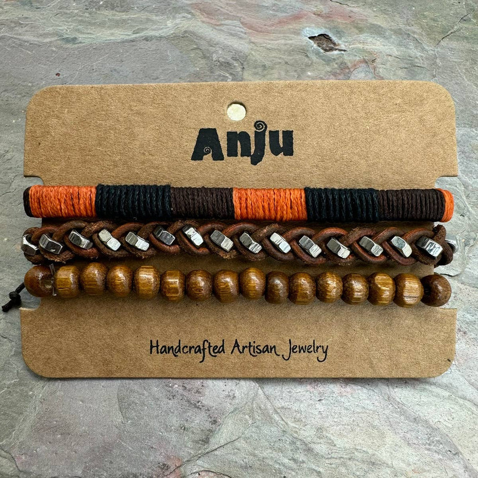 Set of bracelets on a 'Anju' branded card with a textured background