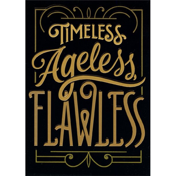 front of card is gold lettering timeless ageless flawless on a black background
