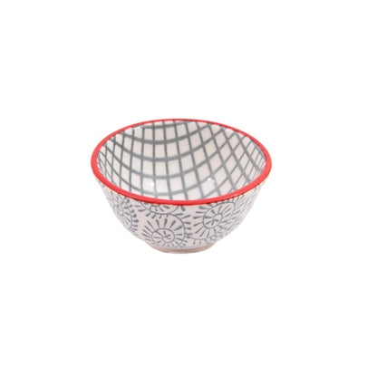 grey patterned pinch bowl with red rim.