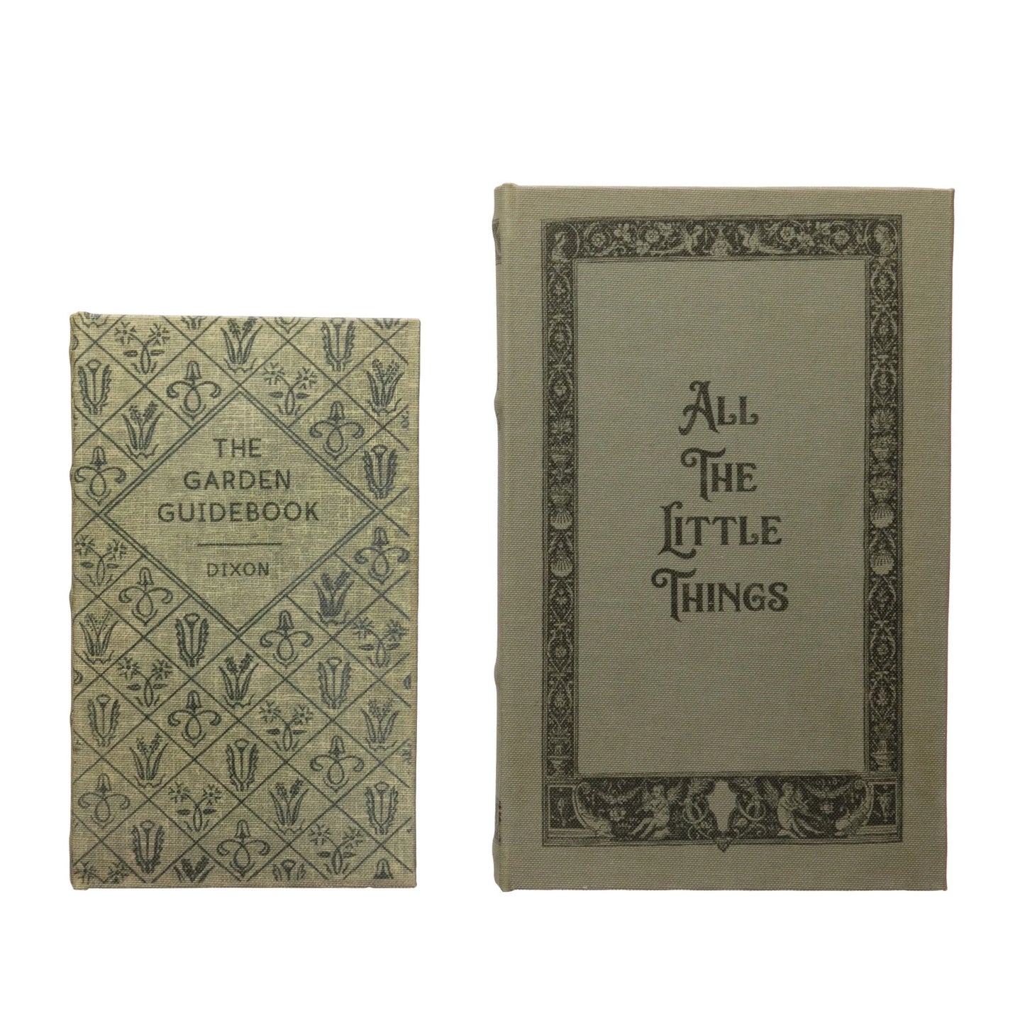 Two green canvas book storage boxes with 'All The Little Things' and 'The Garden Guidebook' text and scrolling designs