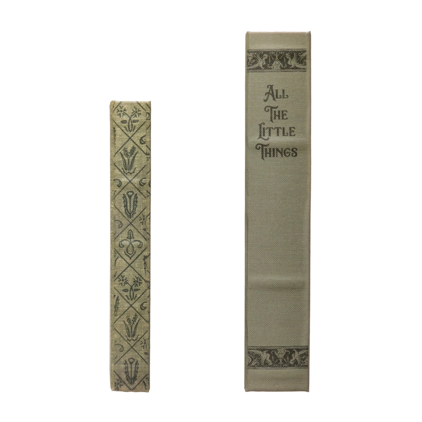 spines of 2 green canvas book boxes