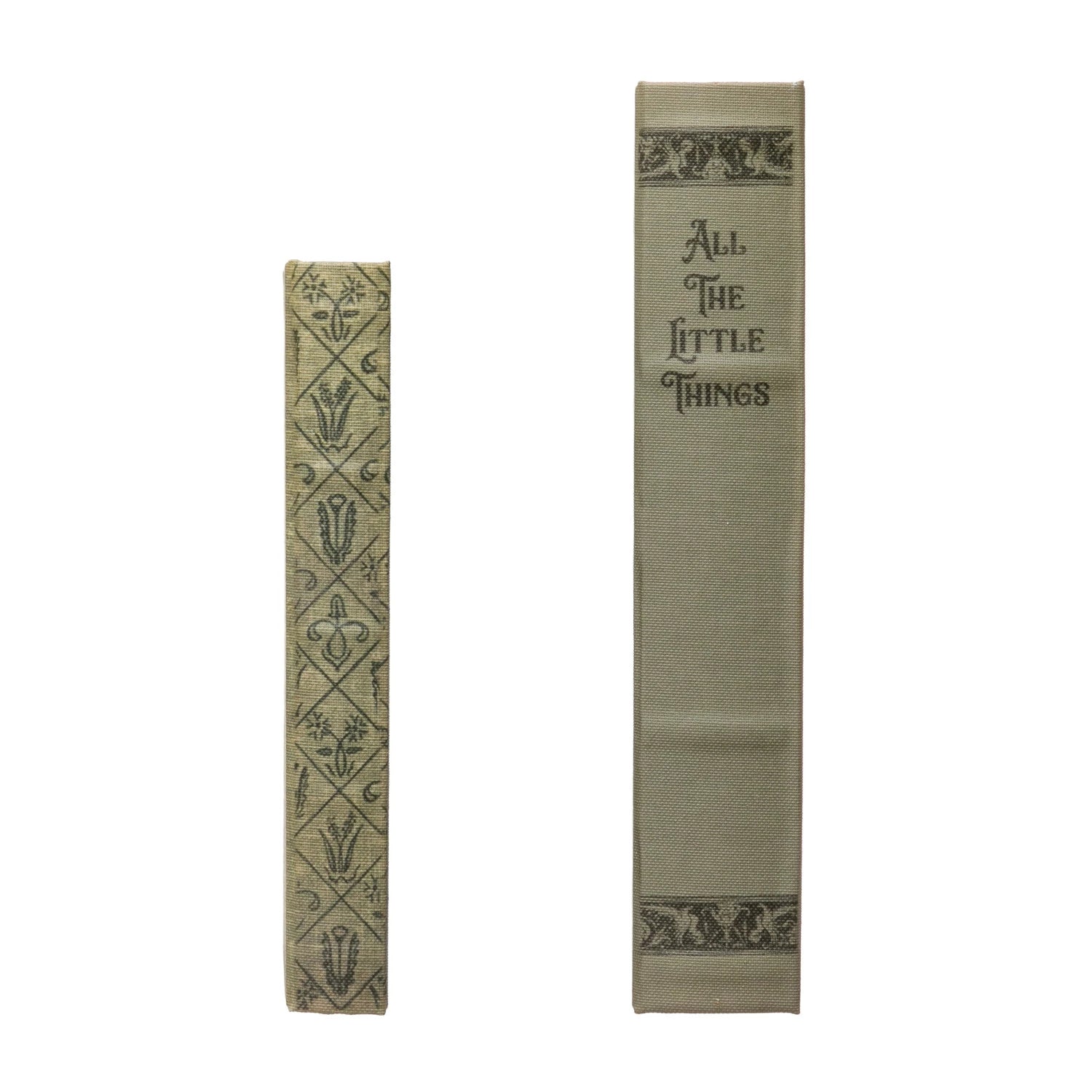 spines of 2 green canvas book boxes
