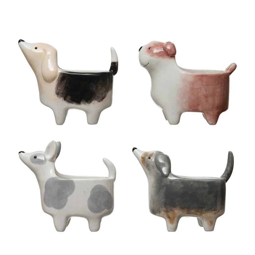 4 styles of dog planters on a white background.